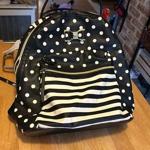 Betsy Johnson leather polka dot and stripe backpack.